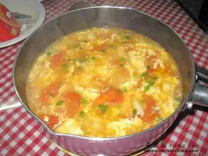 Tomato, potato, egg and flower soup