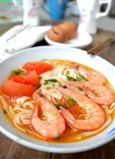 The shrimp tomatoes are hanging