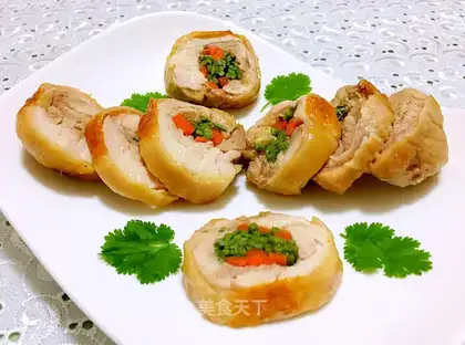 A veggie roll on a tin paper chicken leg