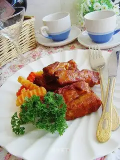 Roast pork chop with red wine and garlic