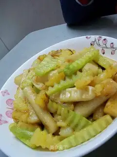 Fried rice cake with potatoes