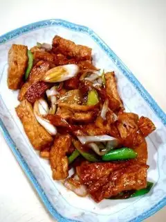 Braised tofu with ginger and onions