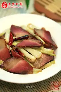 stir-fried Hunan bacon with buckwheat head