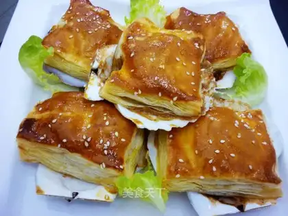 Grilled scallops in meringue