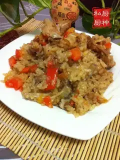 The lamb's hand grabs rice