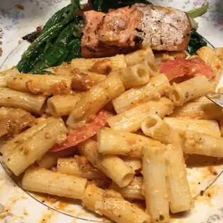 Fried salmon with pasta