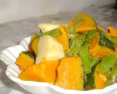 Stewed pumpkin with potatoes and beans