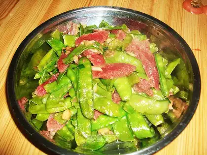 fried sausage with peas