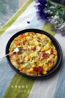 A wide salami pizza