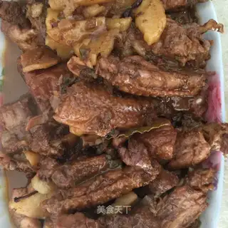 Pork chicken wings and potatoes