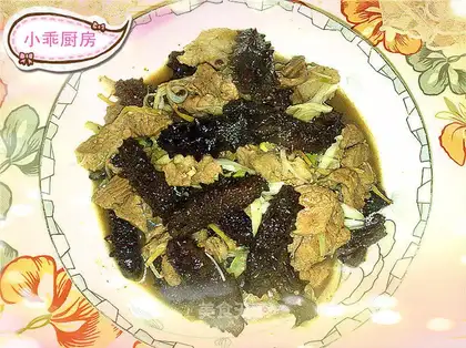 Fried sea cucumber with pork and green onion