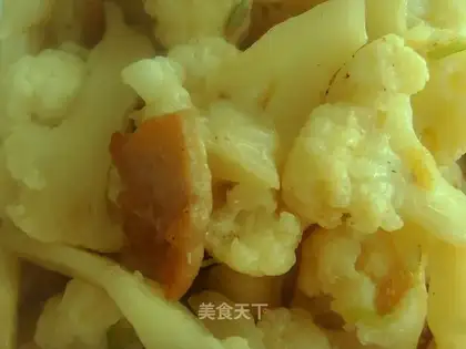 Fried pork slices with cauliflower