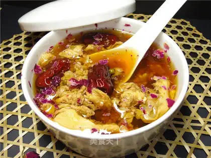 Egg and flower soup made with rose wine