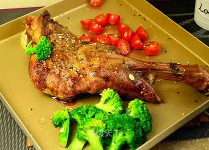 Roasted lamb legs with vegetable salad