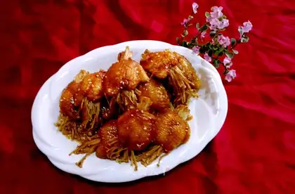 Boiled chicken wings and golden mushrooms
