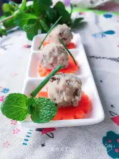 Hands on mushrooms and meatballs