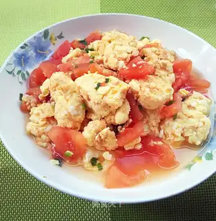 Fried tomato eggs