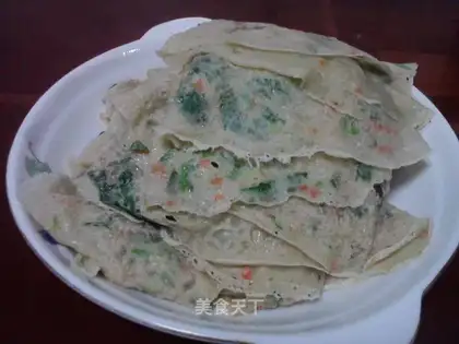 Pancakes with spinach and egg oil