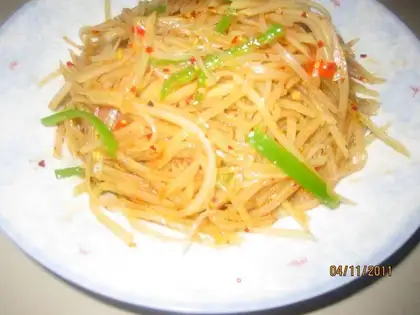 Shredded potatoes with salad