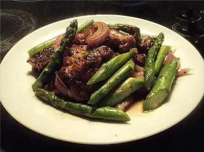 Fried pork with asparagus and onion