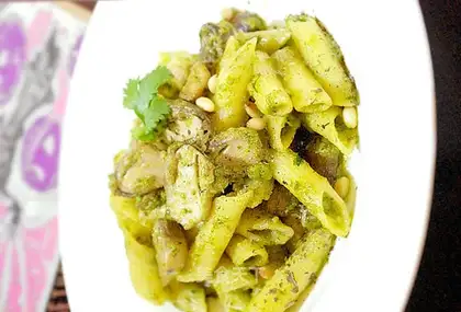 Spaghetti with green sauce and tobacco tube