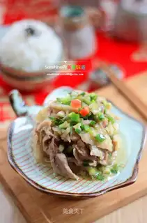 Tore chicken with onions