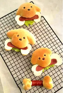 Dogs eat bone sausage bread
