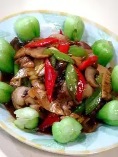 Sliced pork with mushroom in oyster sauce