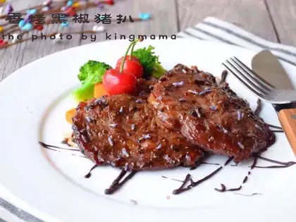 A roasted black pepper pork chop