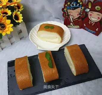 Four cream cake rolls