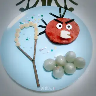 Angry little bird from a watermelon