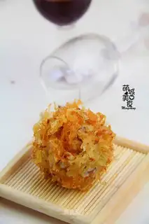A golden embroidery ball