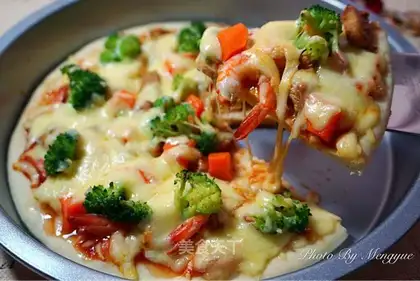 The chicken pizza on the bottom of the shrimp