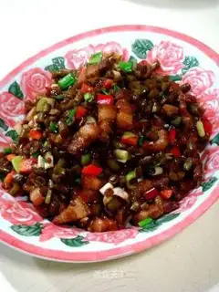 Stewed pork with sour corn in soy sauce