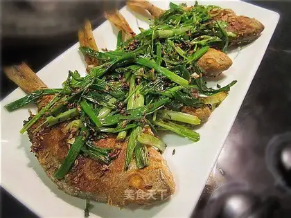 Pan-fried small sea fish with cumin