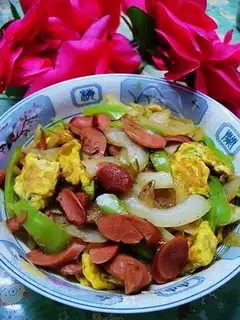 Scrambled ham with onions and eggs