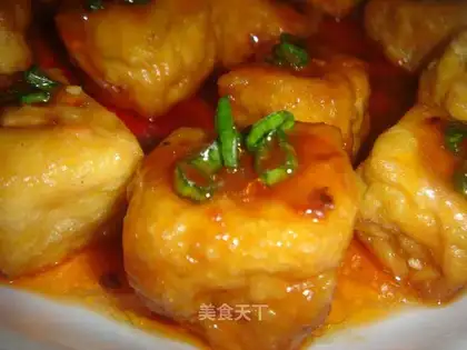 Fried stuffed tofu in tomato sauce