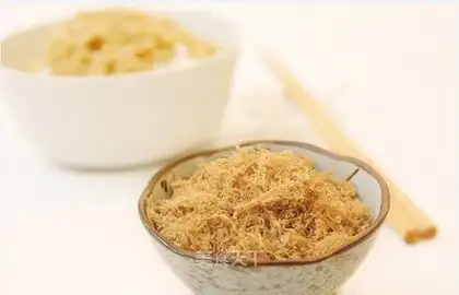 Baby eats pork pine
