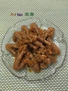 A chicken claw with peppers