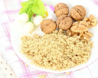 Baby eats walnut powder