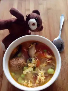Tomatoes, eggnut soup