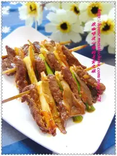 Pan-fried beef fillet skewers