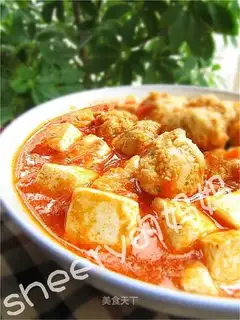 Tofu with meatballs in tomato sauce