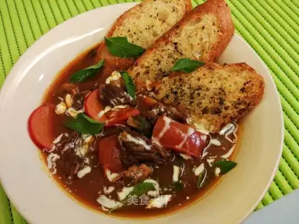 Cowtail soup with garlic buns