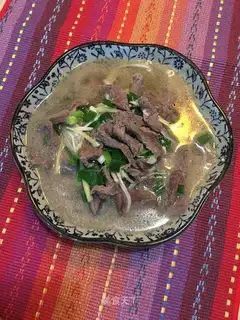 Golden pins and mushroom beef soup