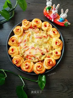 A pizza by roses