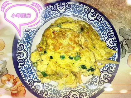 Scrambled eggs with yellow clams