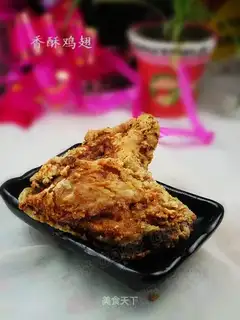 Crispy chicken wings in oyster sauce