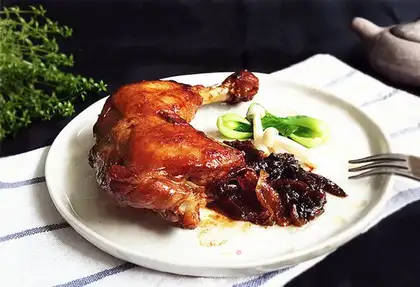 A chicken leg with a tan