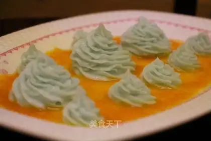 Orange sauce, blueberries, mud
